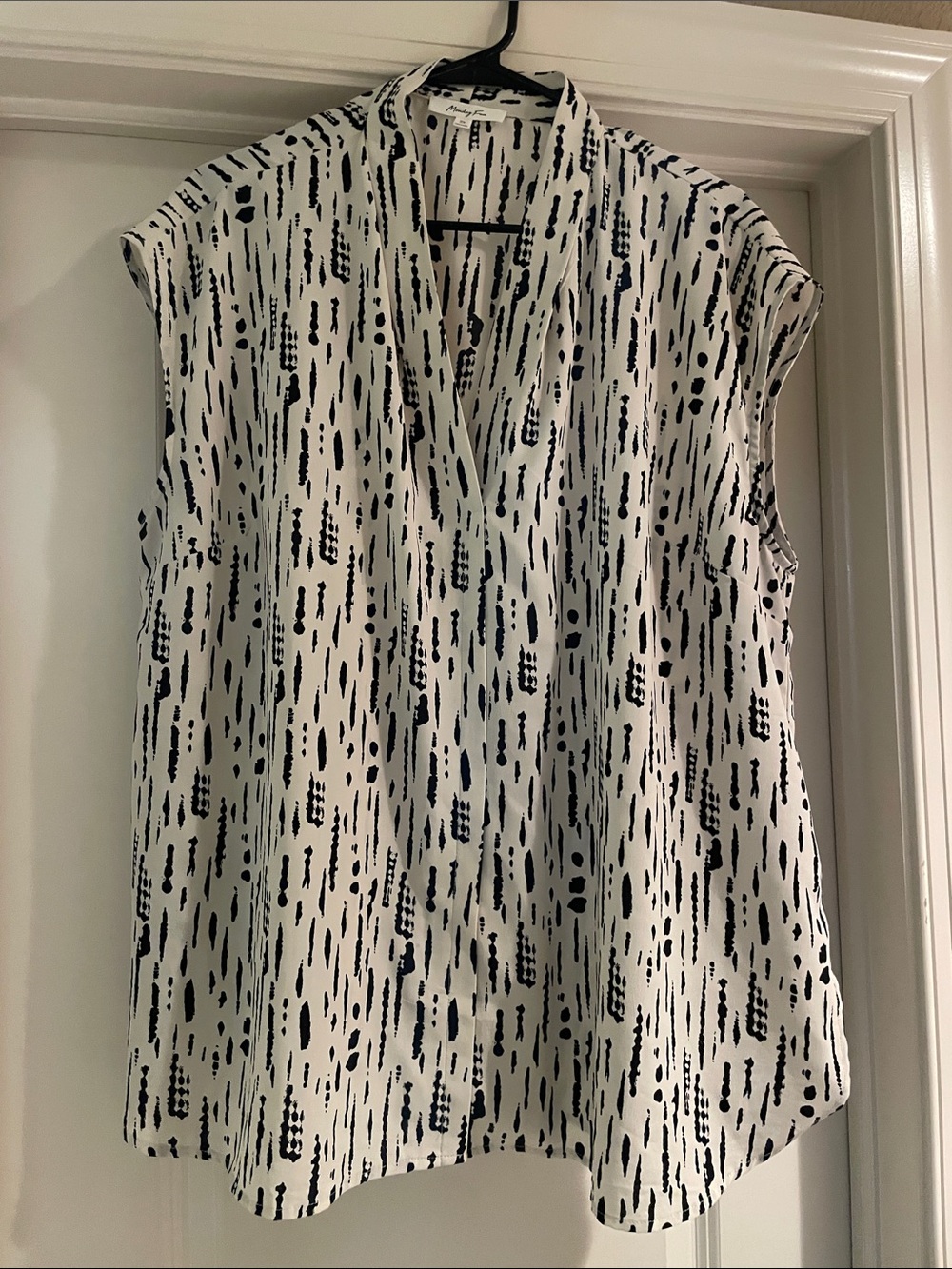 Sleeveless V-Neck White Blouse with Black Dash Print